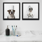 Two framed pictures of dogs in a bathroom setting with toiletries.