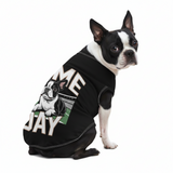 Dog wearing a black t-shirt with a graphic and text on a white background
