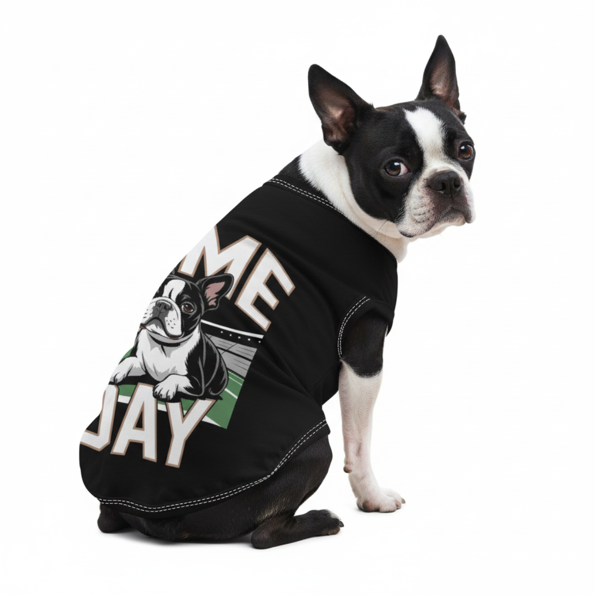 Dog wearing a black t-shirt with a graphic and text on a white background
